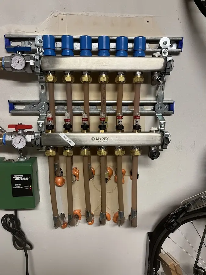 Plumber performing Gas Line Installation at a residential property in Bullskin